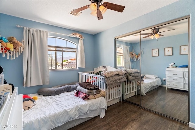 7553 Durham Hall Ave Unit 201, Las Vegas, NV 89130 - bedroom with wood finished floors, a closet, and ceiling fan