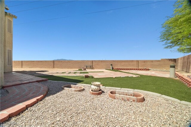 6088 Gulf Island Ave, Las Vegas, NV 89156 - view of yard featuring a patio