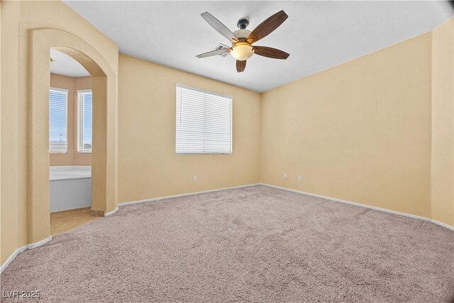 6088 Gulf Island Ave, Las Vegas, NV 89156 - unfurnished room with carpet flooring, ceiling fan, and plenty of natural light