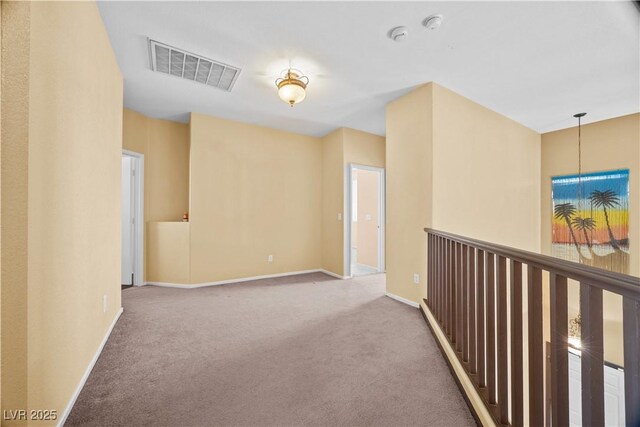 6088 Gulf Island Ave, Las Vegas, NV 89156 - corridor featuring carpet, an upstairs landing, and baseboards
