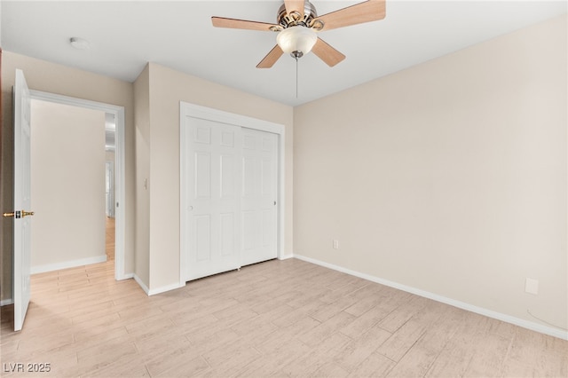 5009 Elm Grove Dr, Las Vegas, NV 89130 - unfurnished bedroom with light wood-type flooring, baseboards, a closet, and ceiling fan