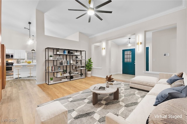 5009 Elm Grove Dr, Las Vegas, NV 89130 - living area featuring ceiling fan, light wood-style flooring, baseboards, and ornamental molding