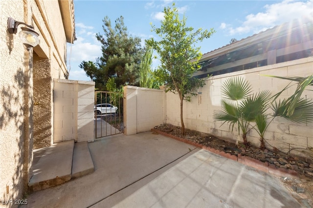 2834 Crystal Lantern Dr, Henderson, NV 89074 - view of patio / terrace with a gate
