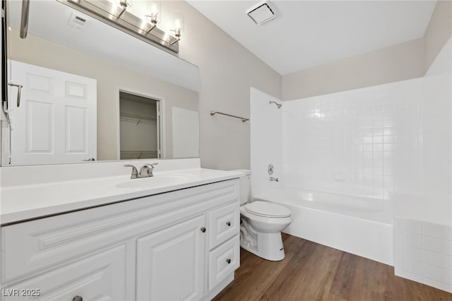 2834 Crystal Lantern Dr, Henderson, NV 89074 - bathroom with wood finished floors, vanity, toilet, and shower / bathtub combination