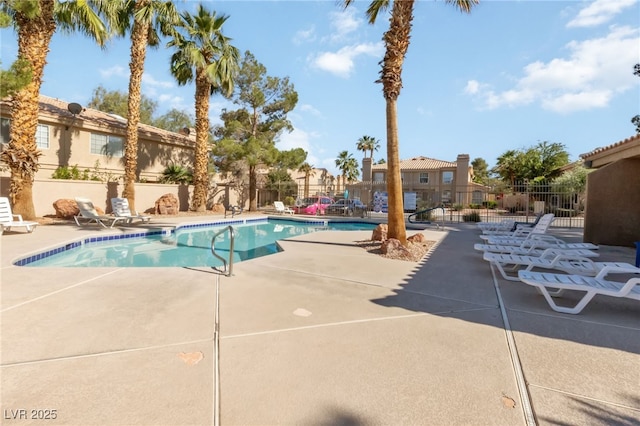 2834 Crystal Lantern Dr, Henderson, NV 89074 - community pool featuring a patio area and a residential view