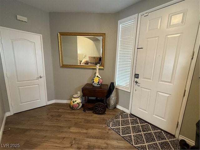 5318 Rio Eldorado Ct, North Las Vegas, NV 89031 - entryway with baseboards and wood finished floors