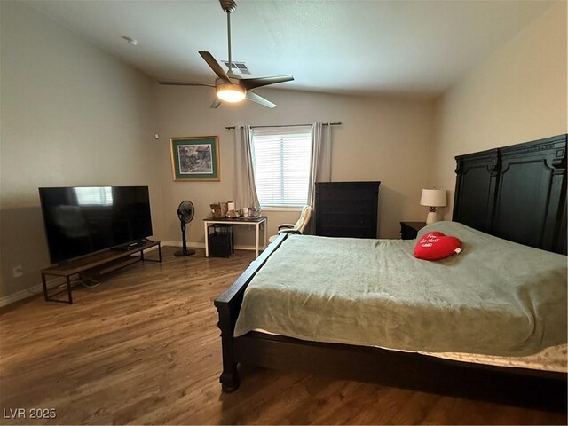 5318 Rio Eldorado Ct, North Las Vegas, NV 89031 - bedroom featuring vaulted ceiling, wood finished floors, baseboards, and a ceiling fan