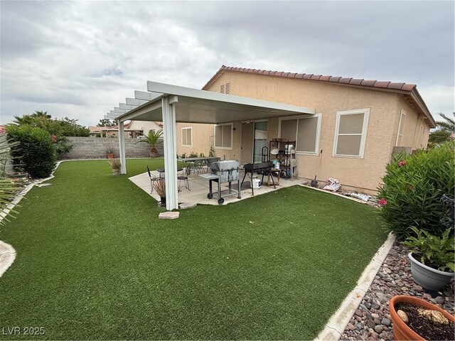 5318 Rio Eldorado Ct, North Las Vegas, NV 89031 - rear view of property featuring a patio and stucco siding