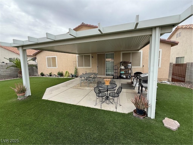 5318 Rio Eldorado Ct, North Las Vegas, NV 89031 - rear view of property featuring stucco siding and a patio area
