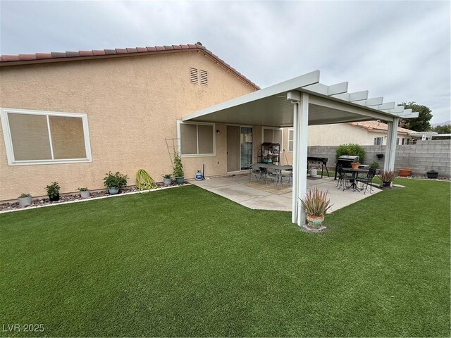 5318 Rio Eldorado Ct, North Las Vegas, NV 89031 - back of property with stucco siding and a patio area