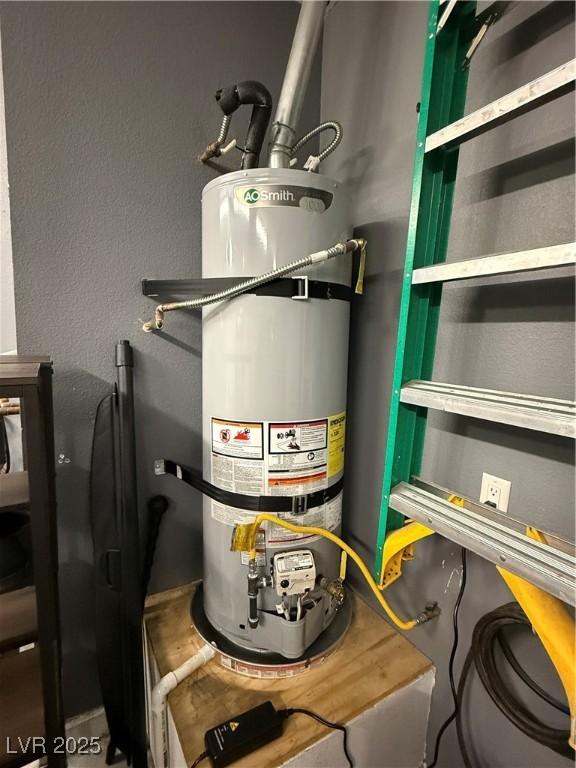 5318 Rio Eldorado Ct, North Las Vegas, NV 89031 - utility room with strapped water heater