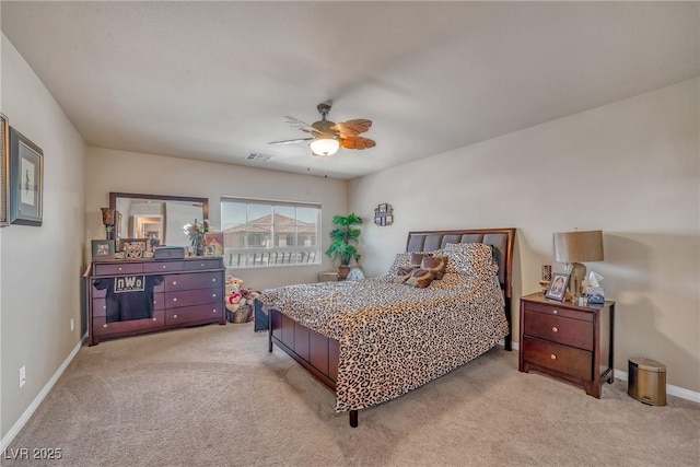6453 Mount Eden Ave, Las Vegas, NV 89139 - bedroom with light colored carpet, baseboards, and a ceiling fan