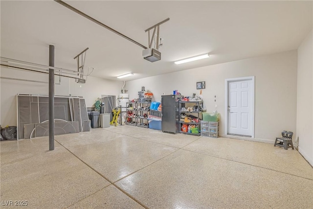 6453 Mount Eden Ave, Las Vegas, NV 89139 - garage featuring a garage door opener