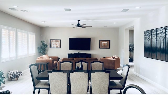 dining area with light wood-style flooring, baseboards, a ceiling fan, and recessed lighting