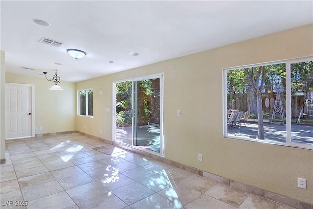 5159 N Monte Cristo Way, Las Vegas, NV 89149 - spare room with baseboards and light tile patterned flooring