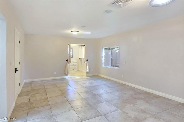 5159 N Monte Cristo Way, Las Vegas, NV 89149 - empty room with light tile patterned flooring and baseboards