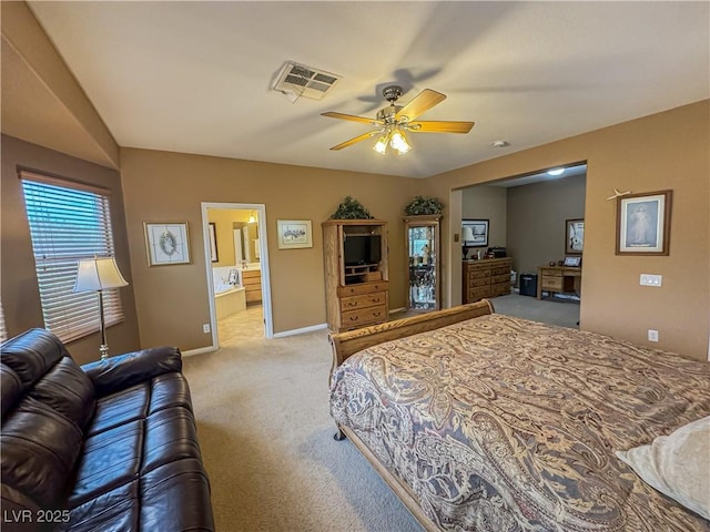 bedroom with light colored carpet, baseboards, and ceiling fan