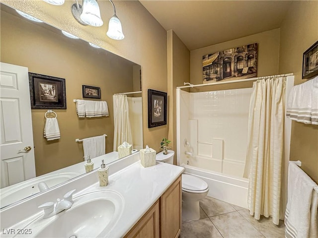 bathroom with vanity, tile patterned flooring, shower / bath combo with shower curtain, and toilet