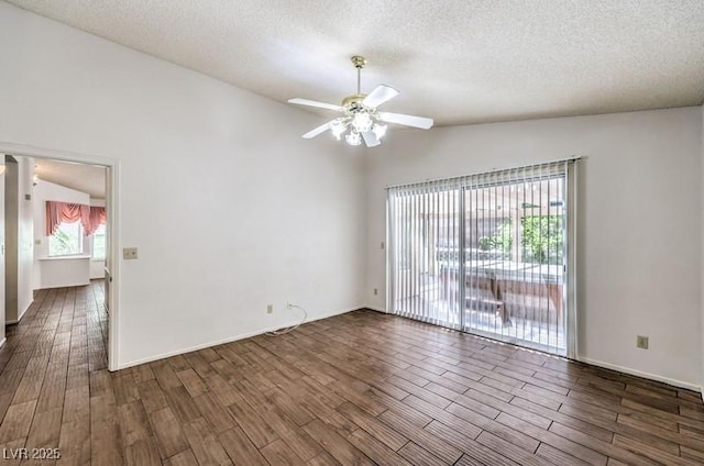 2753 Port Of Call Dr, Las Vegas, NV 89128 - unfurnished room with vaulted ceiling, a textured ceiling, dark wood-style floors, and a ceiling fan