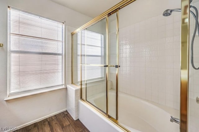 2753 Port Of Call Dr, Las Vegas, NV 89128 - full bath with wood finished floors, enclosed tub / shower combo, and baseboards