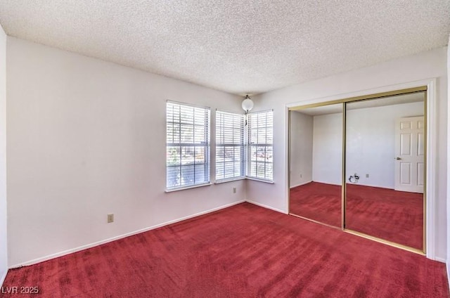 2753 Port Of Call Dr, Las Vegas, NV 89128 - unfurnished bedroom with carpet flooring, a closet, and a textured ceiling
