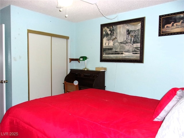 3720 Desert Marina Dr Unit 33, Laughlin, NV 89029 - bedroom with a closet and a textured ceiling