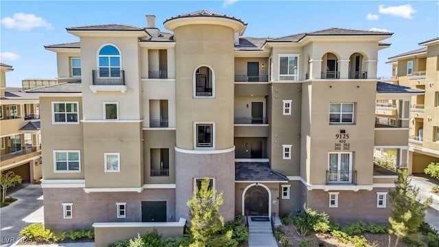 9125 Las Manaitas Ave Unit 302, Las Vegas, NV 89144 - view of apartment building / complex