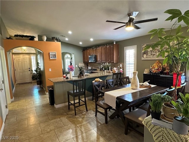 1800 Quail Point Ct, Las Vegas, NV 89117 - dining area with a ceiling fan, arched walkways, recessed lighting, and baseboards