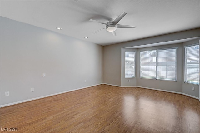 472 Staghorn Pass Ave, Las Vegas, NV 89183 - unfurnished room featuring wood finished floors, ceiling fan, baseboards, and recessed lighting