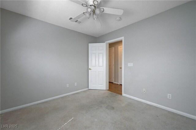 472 Staghorn Pass Ave, Las Vegas, NV 89183 - carpeted empty room featuring baseboards and a ceiling fan