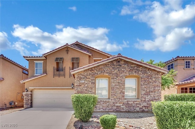 3217 Bonassola Ave, North Las Vegas, NV 89031 - view of front of home featuring stone siding, stucco siding, concrete driveway, and a garage