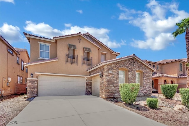 3217 Bonassola Ave, North Las Vegas, NV 89031 - mediterranean / spanish-style house featuring stone siding, stucco siding, a balcony, concrete driveway, and an attached garage