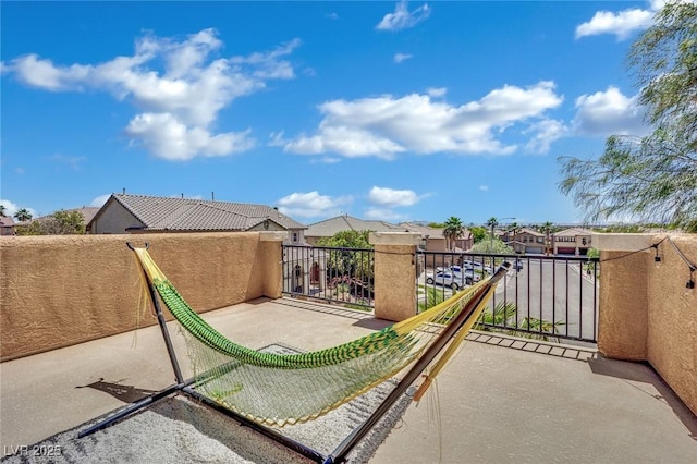 3217 Bonassola Ave, North Las Vegas, NV 89031 - view of patio / terrace with a residential view and a balcony
