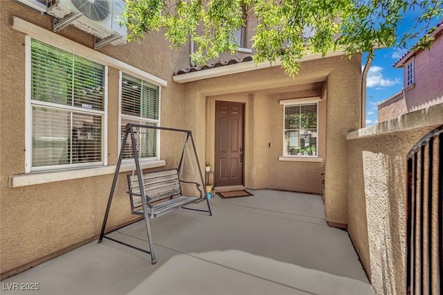 3217 Bonassola Ave, North Las Vegas, NV 89031 - entrance to property with stucco siding and ac unit