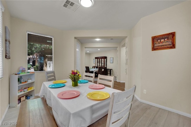 3217 Bonassola Ave, North Las Vegas, NV 89031 - dining room with light wood finished floors and baseboards