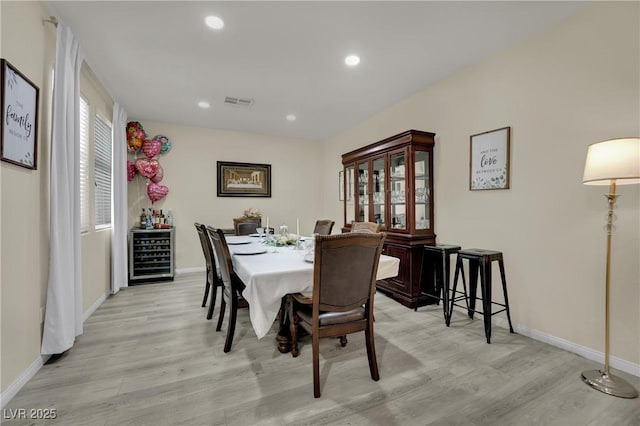 3217 Bonassola Ave, North Las Vegas, NV 89031 - dining room featuring wine cooler, light wood finished floors, baseboards, and recessed lighting