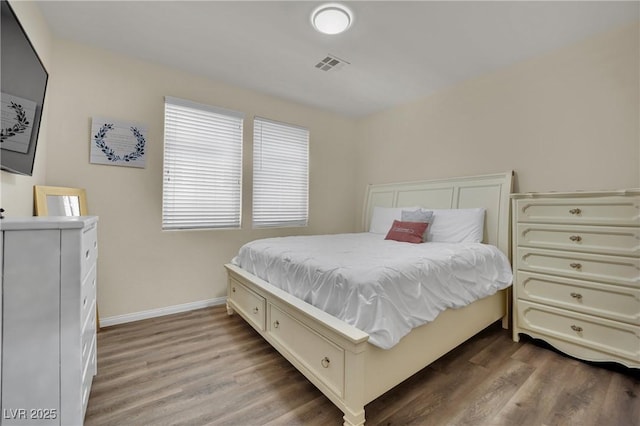 3217 Bonassola Ave, North Las Vegas, NV 89031 - bedroom with wood finished floors and baseboards