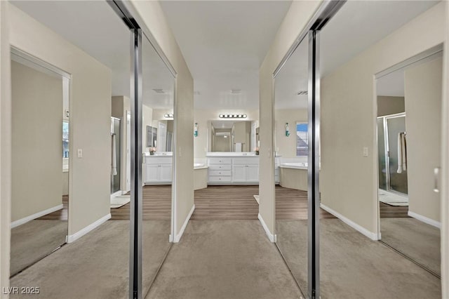 3217 Bonassola Ave, North Las Vegas, NV 89031 - bathroom with vanity, a stall shower, and baseboards