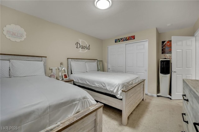 3217 Bonassola Ave, North Las Vegas, NV 89031 - bedroom featuring light colored carpet, a closet, and baseboards
