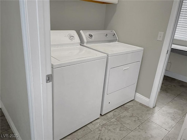 3217 Bonassola Ave, North Las Vegas, NV 89031 - washroom featuring washing machine and dryer and baseboards