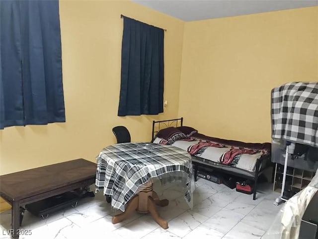 3217 Bonassola Ave, North Las Vegas, NV 89031 - bedroom featuring marble look tile flooring