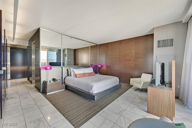 4381 W Flamingo Rd Unit 1101, Las Vegas, NV 89103 - bedroom with light marble finish floors