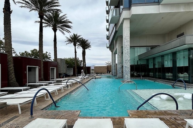 4381 W Flamingo Rd Unit 1101, Las Vegas, NV 89103 - community pool with a patio area