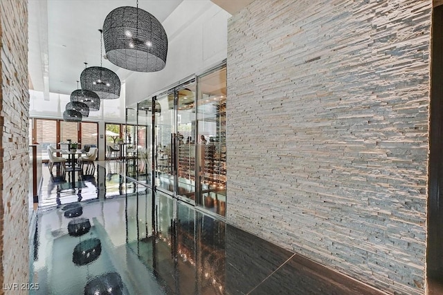 4381 W Flamingo Rd Unit 1101, Las Vegas, NV 89103 - corridor featuring a towering ceiling
