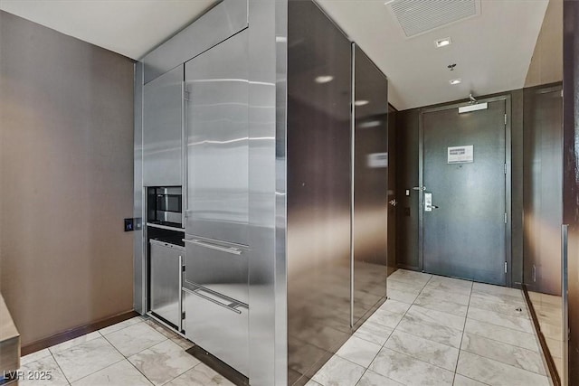 4381 W Flamingo Rd Unit 1101, Las Vegas, NV 89103 - hall featuring light marble finish flooring