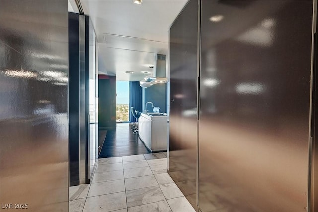 4381 W Flamingo Rd Unit 1101, Las Vegas, NV 89103 - hall featuring expansive windows