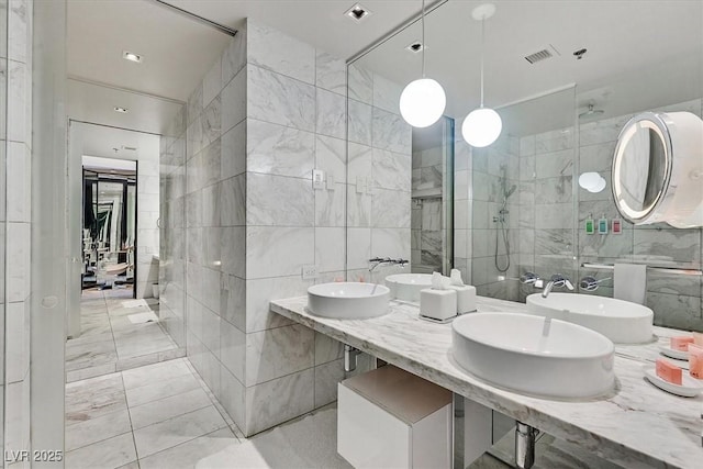 4381 W Flamingo Rd Unit 1101, Las Vegas, NV 89103 - full bath featuring tile walls and double vanity
