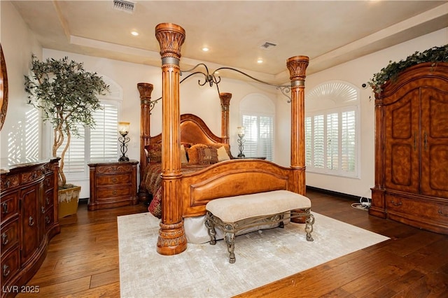 7625 Coley Ave, Las Vegas, NV 89117 - bedroom with wood-type flooring, recessed lighting, and ornate columns