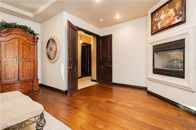 7625 Coley Ave, Las Vegas, NV 89117 - bedroom with hardwood / wood-style floors, baseboards, and recessed lighting