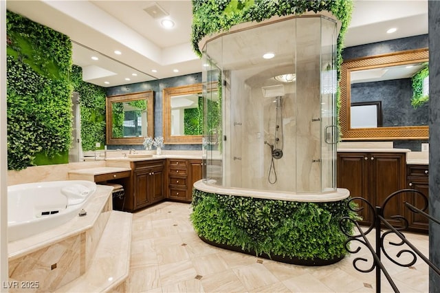 7625 Coley Ave, Las Vegas, NV 89117 - bathroom with vanity, a shower stall, a garden tub, recessed lighting, and backsplash